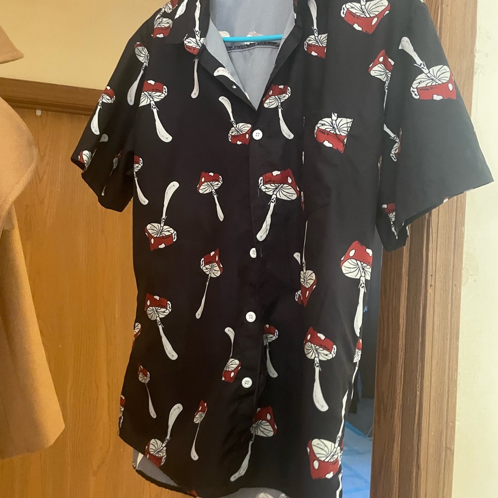 Dress shirt very comfortable light weight put a tank top under.
